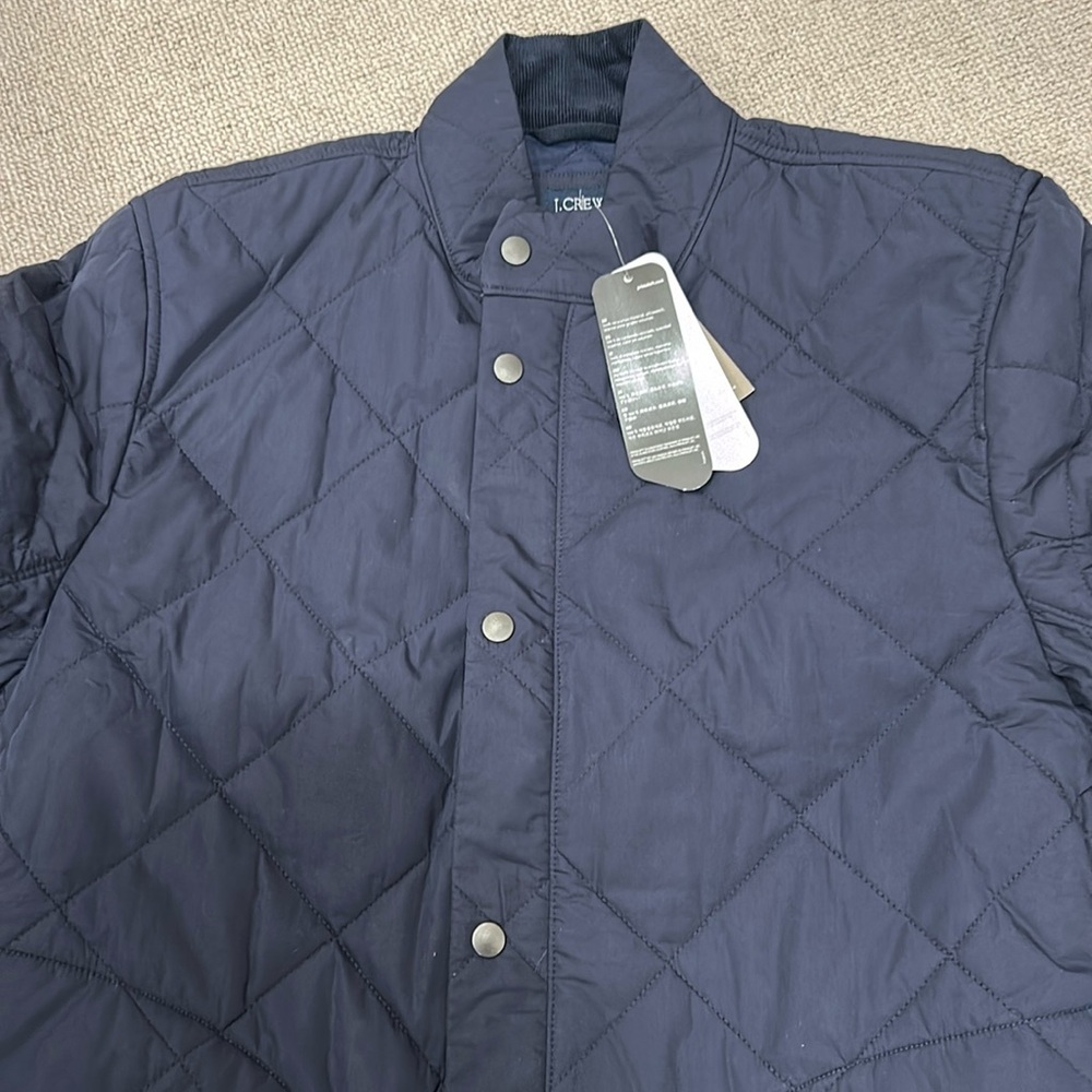 Women’s large permaloft barn jacket with tags. Never worn.